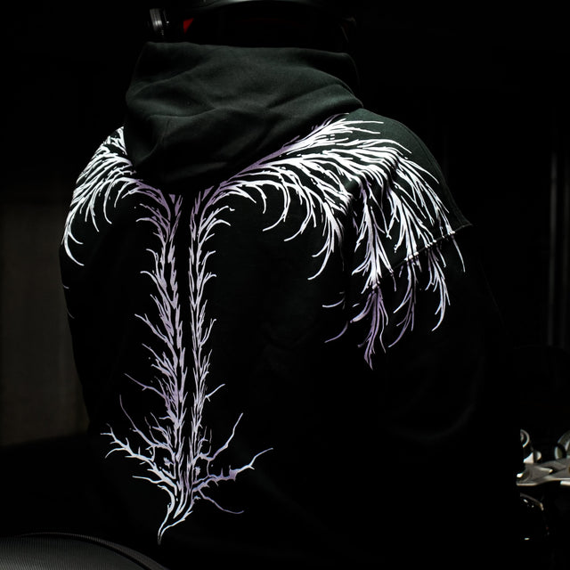 AUXESIS hoodie worn in the field